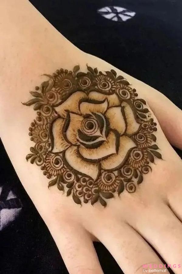 Photo of beautiful rose flower back hand mehndi design