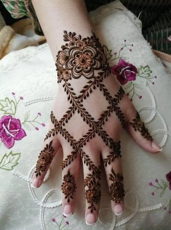 Photo of Criss-Cross Henna Design With Clean Detail
