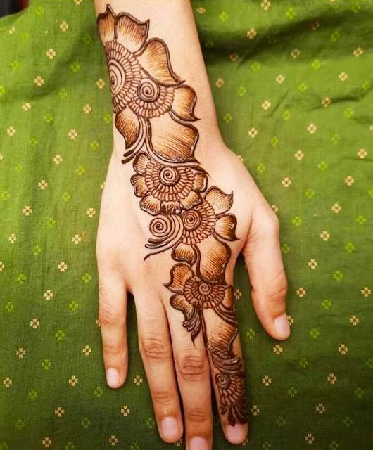 Modern Backhand Arabic Mehndi Photo of Modern Backhand Arabic Mehndi