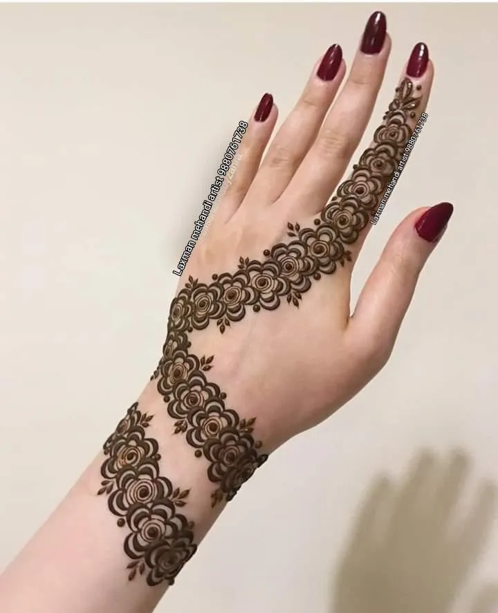 Photo of bracelet mehndi design back hand finger to wrist