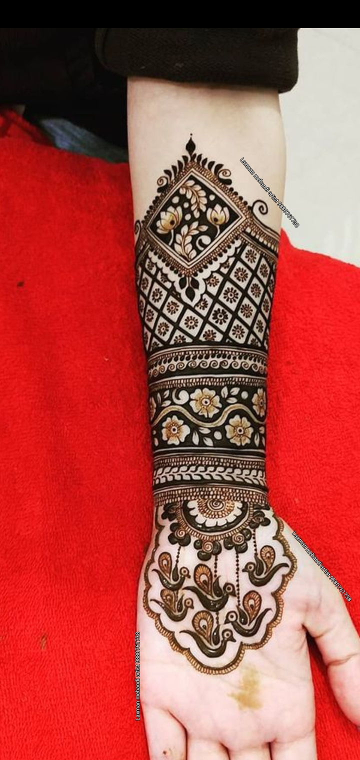 Simple Full-Hand Mehndi Designs Photo of Simple Full-Hand Mehndi Designs