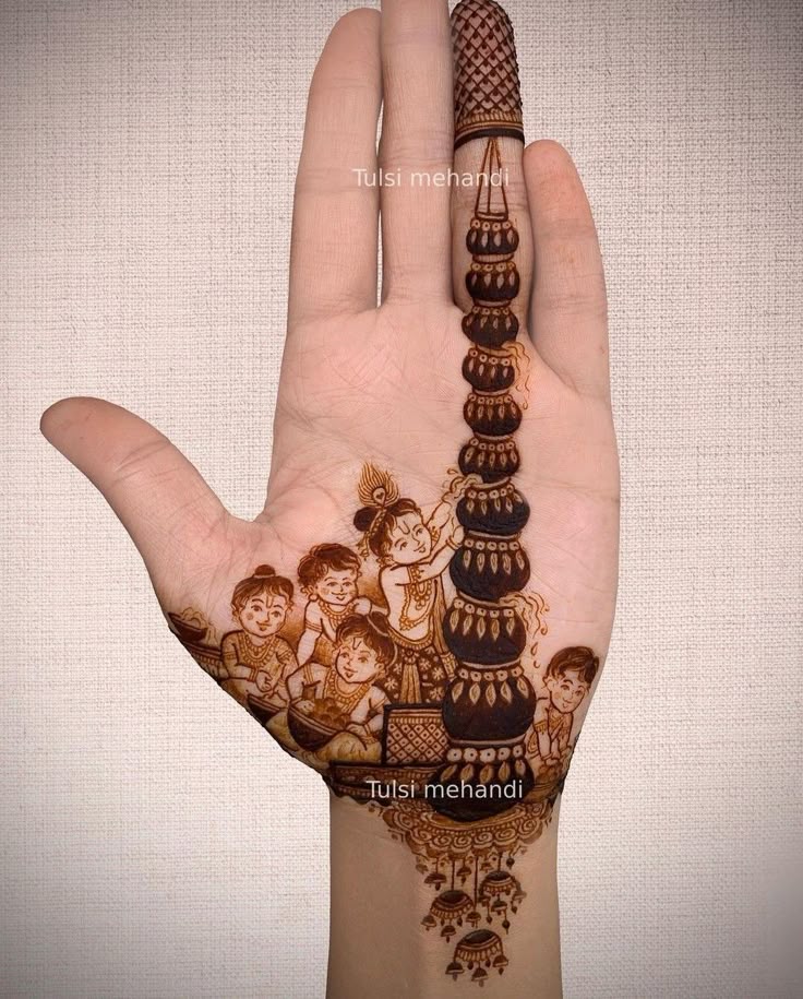 Kids Janmashtami Matki-inspired Mehendi Design on Front Hand Photo of Kids Janmashtami Matki-inspired Mehendi Design on Front Hand