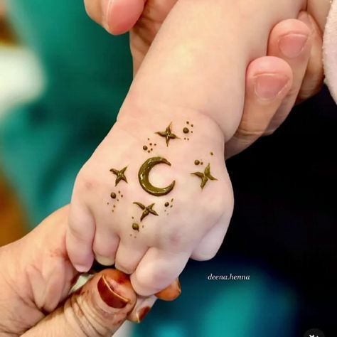 Tiny Celestial Henna for baby backhand Photo of Tiny Celestial Henna for baby backhand