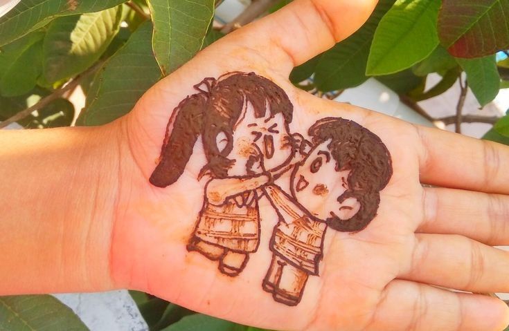 Sibling-Inspired Mehendi Design on front hand Photo of Sibling-Inspired Mehendi Design on front hand