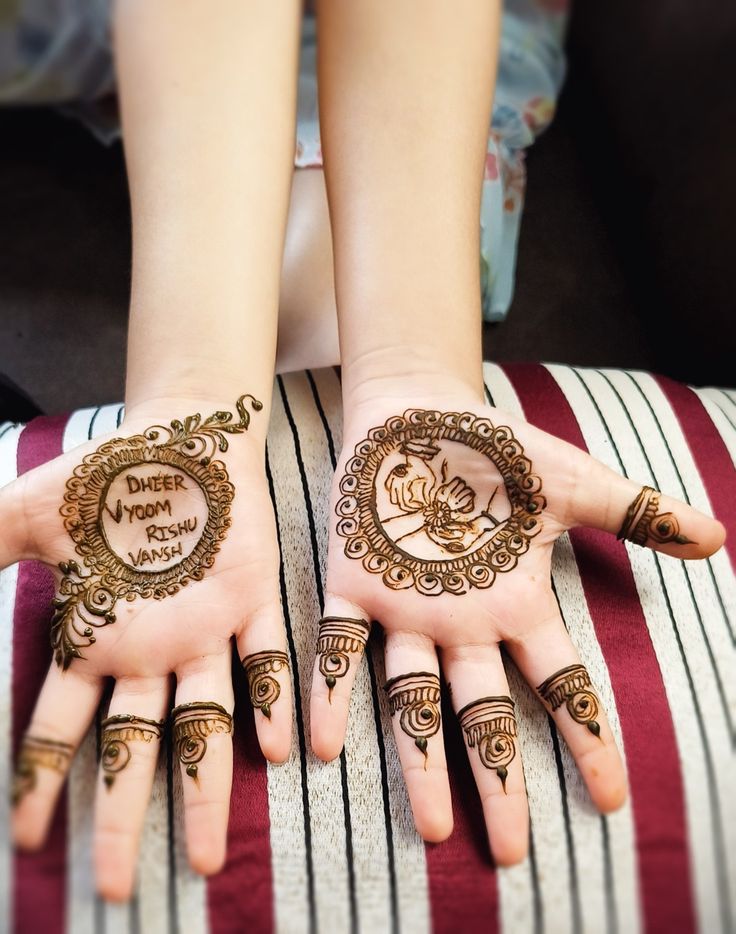 Raksha Bandhan Siblings Name Mehendi on kids front hand Photo of Raksha Bandhan Siblings Name Mehendi on kids front hand