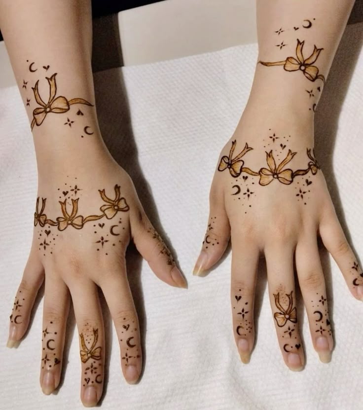 Mehndi Bracelets with Bows and Moons for kids Photo of Mehndi Bracelets with Bows and Moons for kids