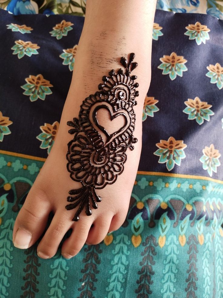 Floral heart foot mehndi design Photo of Floral heart foot mehndi design