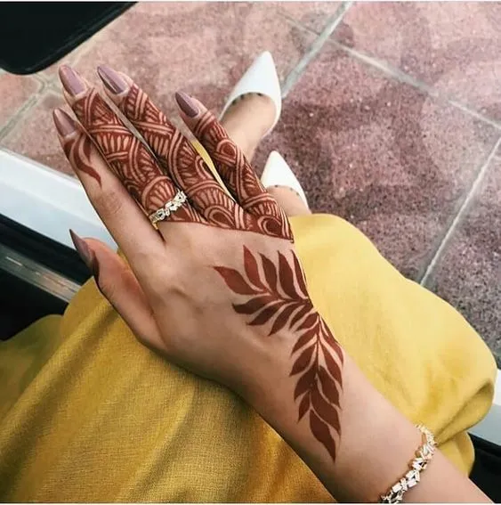 leaf mehndi design on backhand Photo of leaf mehndi design on backhand