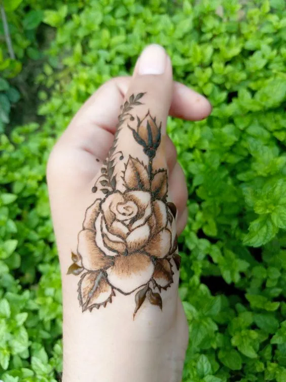 Blooming Rose Henna Design on Thumb Photo of Blooming Rose Henna Design on Thumb