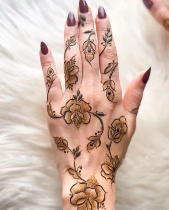 Photo of simple rose mehndi design on backhand