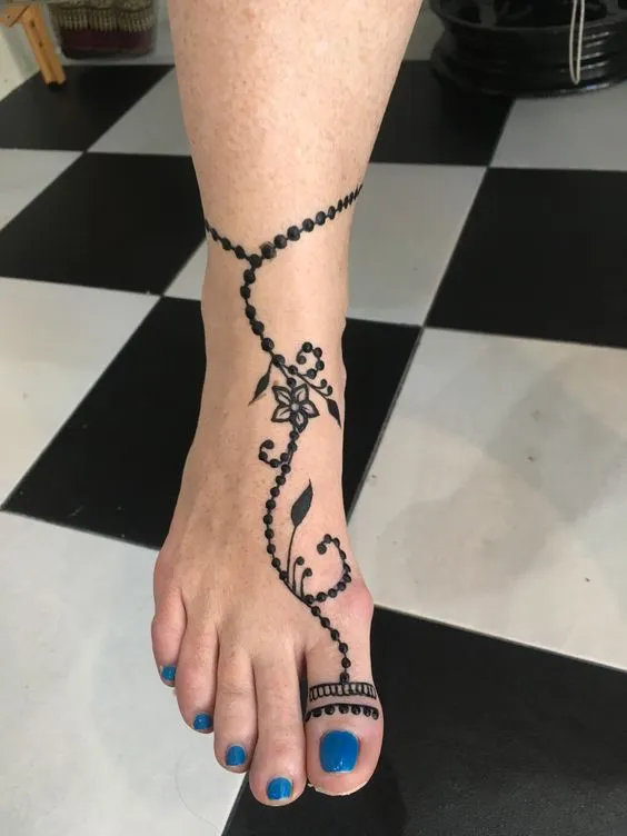 Photo of stunning jewellery mehndi design on feet