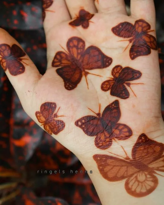 Photo of Butterfly on your palm with special bharwa mehndi design touch