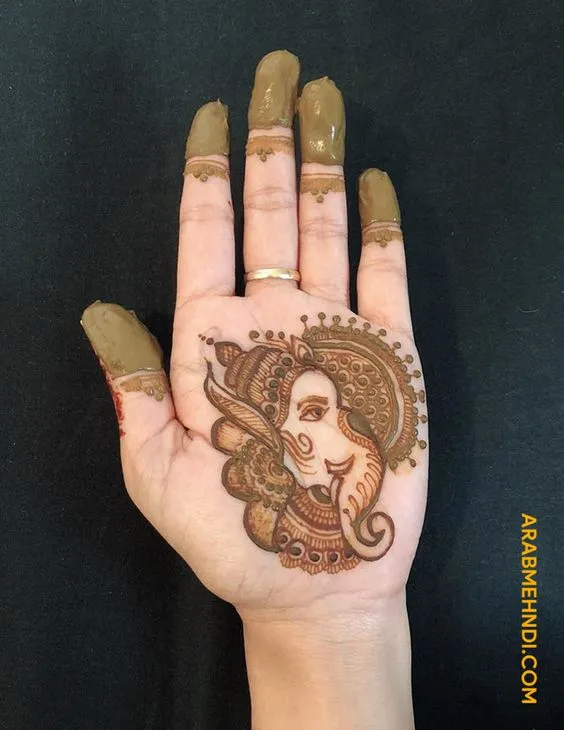 Photo of Ganesh mehndi design on front hand