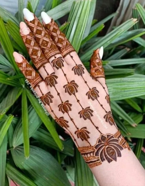 Photo of Beautiful Lotus Mehndi Design for Teej