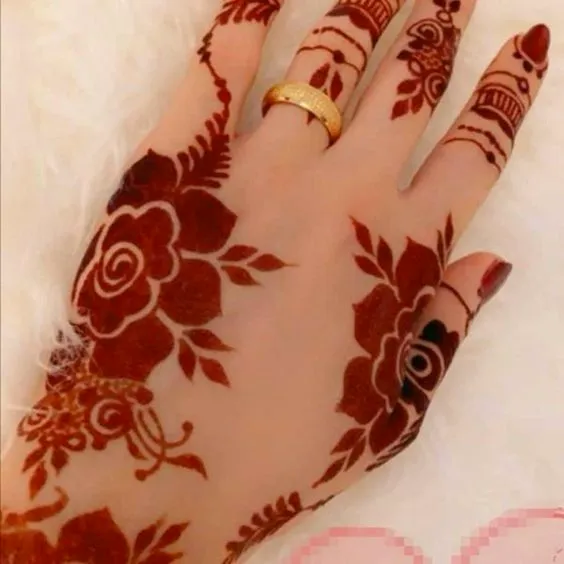 Photo of rose petals mehndi design for bride