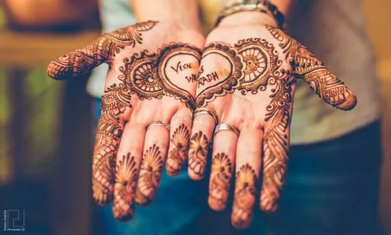 Photo of Simple trendy mehndi design with a full name on it