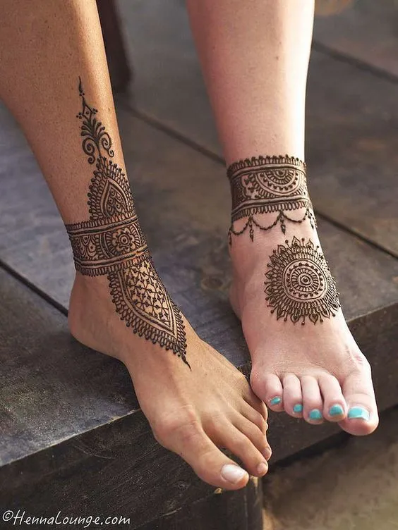 Photo of Couple tattoo mehndi design for legs