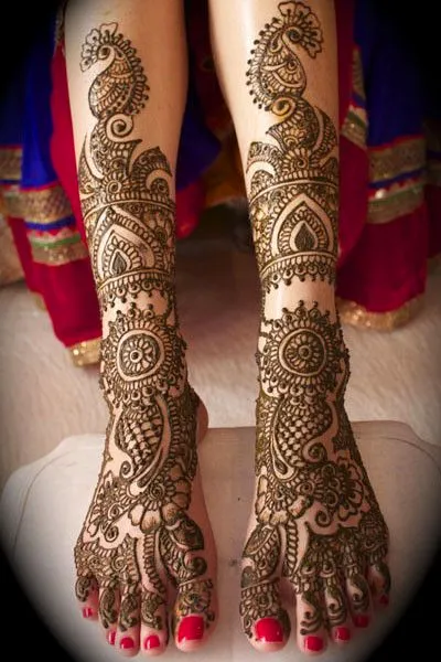 Photo of Full-leg Arabic tattoo mehndi design