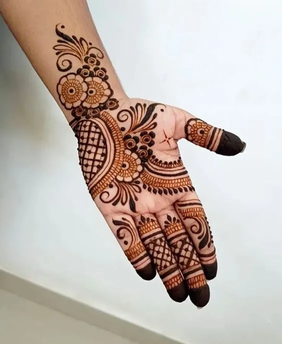Beautiful front-hand henna tattoo design Photo of Beautiful front-hand henna tattoo design