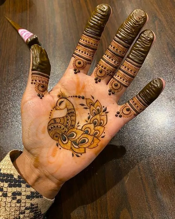 Simple peacock tattoo mehndi for the groom Photo of Simple peacock tattoo mehndi for the groom