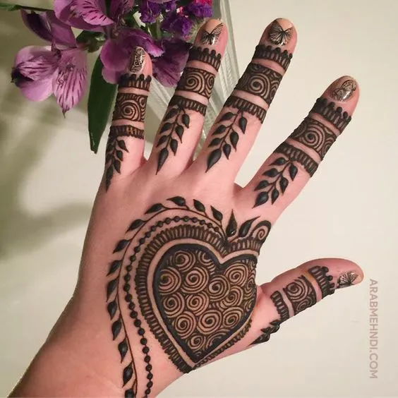 Photo of Heart mehndi for the backhand